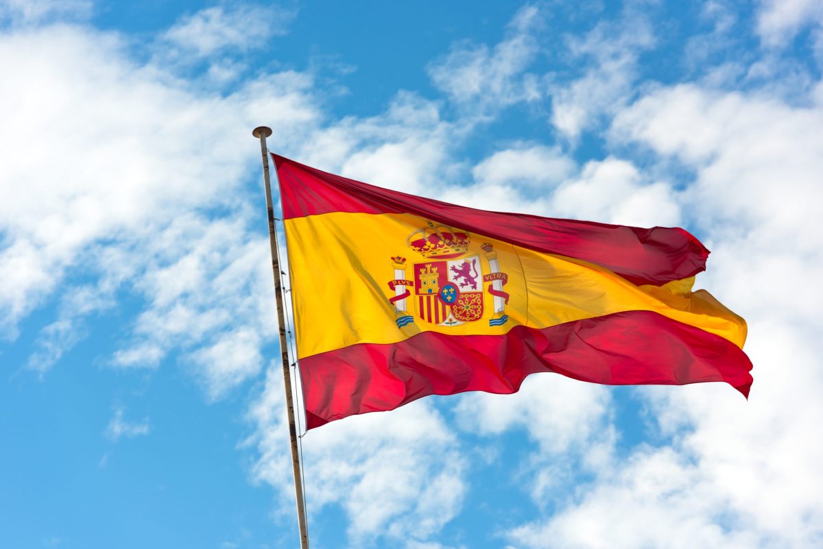 national-flag-of-spain-on-blue-sky-background-2024-12-16-06-04-20-utc