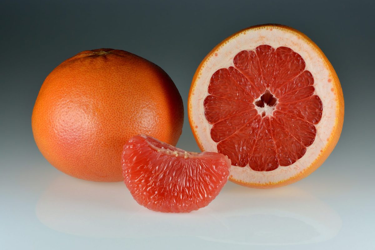 Red grapefruit variety – whole, halved and peeled segment